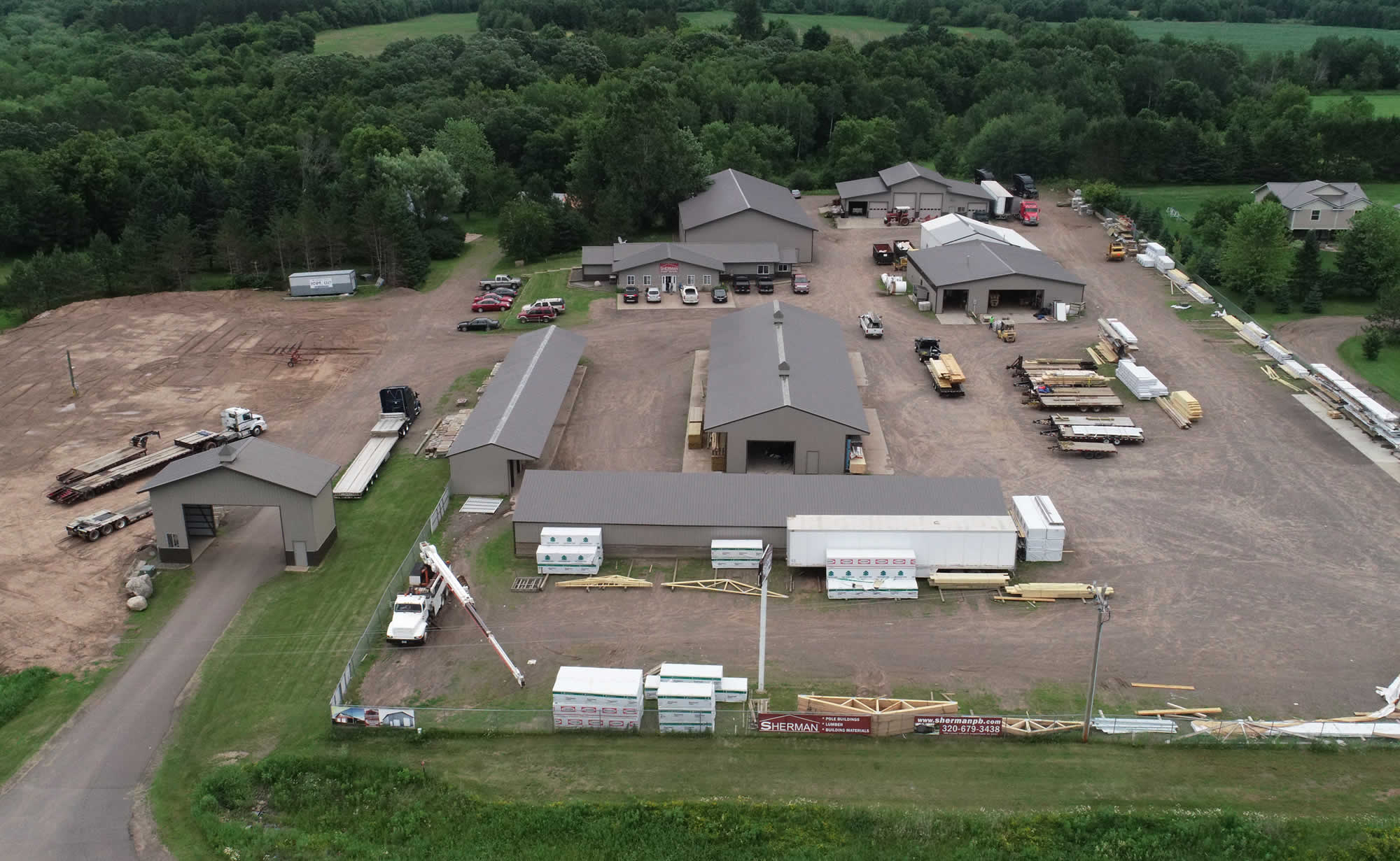Aerial view of Sherman Lumber yard in Mora, Minnesota